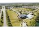 An expansive aerial view of the community, showing the amenity center, pool, and park at 2335 Whitewing Ln, Wendell, NC 27591