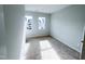 Bright bedroom with plush carpet, windows, and neutral paint at 2335 Whitewing Ln, Wendell, NC 27591