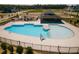 Community pool featuring zero entry point, lap lanes, gathering pavilion, and playground at 2335 Whitewing Ln, Wendell, NC 27591