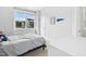 Bedroom with a large window, decor, and a view of the home's exterior at 26 Stone Bridge Xing, Chapel Hill, NC 27517