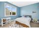 Bedroom with a window, bed, and adjacent desk space at 26 Stone Bridge Xing, Chapel Hill, NC 27517