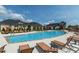 Community pool area with lounge chairs and well maintained building at 26 Stone Bridge Xing, Chapel Hill, NC 27517