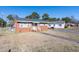Cozy brick house with white trim, an awning, and a well-kept lawn at 2608 Walley St, Rocky Mount, NC 27803