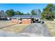 Charming brick home featuring a covered carport and well-maintained front yard at 2608 Walley St, Rocky Mount, NC 27803