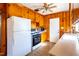 Functional kitchen with wood cabinetry, a gas range, and lots of workspace at 2608 Walley St, Rocky Mount, NC 27803