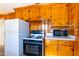 Functional kitchen featuring wood cabinets and modern appliances, perfect for cooking at 2608 Walley St, Rocky Mount, NC 27803