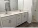 Modern bathroom with double vanity, granite countertops, and separate shower with glass door at 338 Tormore Dr, Homesite 123, Sanford, NC 27330