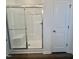 Modern bathroom features a glass shower enclosure with a built-in bench and sleek fixtures at 338 Tormore Dr, Homesite 123, Sanford, NC 27330