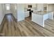 Bright, eat-in kitchen with white cabinets, granite countertops, and stainless steel appliances at 338 Tormore Dr, Homesite 123, Sanford, NC 27330