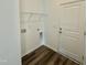 Practical laundry room features storage shelf, utility sink hookups, and convenient access at 338 Tormore Dr, Homesite 123, Sanford, NC 27330
