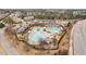 Bird's-eye view of the neighborhood pool and recreational facilities in a well-maintained community surrounded by mature trees at 3924 Overcup Oak Ln, Cary, NC 27519