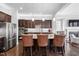 Spacious kitchen with stainless steel appliances, granite counters, and a large center island at 3924 Overcup Oak Ln, Cary, NC 27519