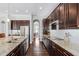 Well-equipped kitchen with stainless appliances, granite countertops, and ample cabinet storage at 3924 Overcup Oak Ln, Cary, NC 27519