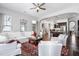 Spacious living room features an open floor plan with hardwood floors and seamless flow into kitchen at 3924 Overcup Oak Ln, Cary, NC 27519