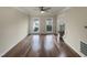 Well-lit living room with hardwood floors and large windows for natural light at 4 Strowd Ct, Durham, NC 27703