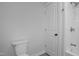Bathroom with toilet and shower-tub combo at 408 Charlotte Ave, Sanford, NC 27330