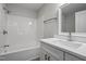 Bathroom featuring modern fixtures, a shower-tub combo, and a stylish vanity with storage at 408 Charlotte Ave, Sanford, NC 27330