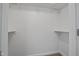 Walk-in closet with shelving and neutral carpet at 408 Charlotte Ave, Sanford, NC 27330
