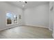 Bright living room with vaulted ceilings, large windows, and modern flooring at 408 Charlotte Ave, Sanford, NC 27330