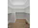 Spacious walk-in pantry with lighting and wooden floors at 408 Charlotte Ave, Sanford, NC 27330