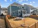 Backyard with a cozy fire pit and deck for relaxing at 5121 Windmere Chase Dr, Raleigh, NC 27616