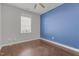 Bedroom with a neutral color scheme, carpet flooring, and natural light from one window at 5121 Windmere Chase Dr, Raleigh, NC 27616