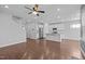 Bright, open-concept kitchen with stainless steel appliances and a central island at 5121 Windmere Chase Dr, Raleigh, NC 27616