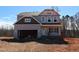 New construction home with gray siding, awaiting final touches at 5372 Salem Woods Dr # 18, Graham, NC 27253