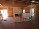 Unfinished Living Room with exposed framing, fireplace and a sliding glass door at 5372 Salem Woods Dr # 18, Graham, NC 27253
