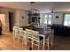 Spacious dining area with large table and view of the living room at 582 Harnett Central Rd, Fuquay Varina, NC 27526