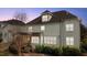 A spacious outdoor wooden deck and lush green landscape enhance the backyard view at 6205 Roles Saddle Dr, Rolesville, NC 27571