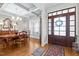 This dining room features hardwood floors, a coffered ceiling and natural light at 6205 Roles Saddle Dr, Rolesville, NC 27571