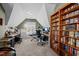 Bright home office with built in bookshelves and vaulted ceiling at 6205 Roles Saddle Dr, Rolesville, NC 27571