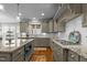 Gourmet kitchen with granite countertops, stainless steel appliances, and a gas cooktop at 6205 Roles Saddle Dr, Rolesville, NC 27571