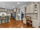 Fully equipped kitchen with stainless appliances, light gray cabinetry, and a built-in desk area at 6205 Roles Saddle Dr, Rolesville, NC 27571