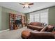 Cozy living room featuring built-in bookshelves and comfortable seating at 6205 Roles Saddle Dr, Rolesville, NC 27571