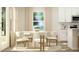 Bright eating area with views and a modern table at 704 Shea Hill Dr, Angier, NC 27501
