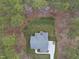 Home is a wooded lot with circle of trees at 85 Willow Bend Dr, Youngsville, NC 27596