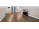 Spacious bonus room featuring hardwood floors, neutral paint, and a media center at 85 Willow Bend Dr, Youngsville, NC 27596