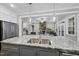 Gourmet kitchen with granite countertops, stainless steel appliances, and white cabinets at 85 Willow Bend Dr, Youngsville, NC 27596