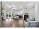 Bright and airy living room that opens into a kitchen with hardwood floors and lots of seating at 85 Willow Bend Dr, Youngsville, NC 27596