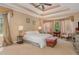 Cozy bedroom with tray ceiling, decorative curtains, and comfortable furnishings at 101 Tussled Ivy Way, Cary, NC 27513