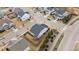 An aerial view of a home in a suburban neighborhood at a street corner with sidewalks at 1024 Traditions Ridge Dr, Wake Forest, NC 27587