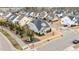 An aerial view of a suburban home with manicured landscaping on a corner lot, in a residential neighborhood at 1024 Traditions Ridge Dr, Wake Forest, NC 27587