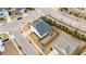An aerial view of a home in a suburban neighborhood with a corner lot and crosswalk nearby at 1024 Traditions Ridge Dr, Wake Forest, NC 27587