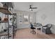 Bright office space with desk, shelves, and comfortable seating at 1024 Traditions Ridge Dr, Wake Forest, NC 27587