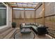Inviting outdoor seating area with comfortable furniture and a stylish pergola at 1024 Traditions Ridge Dr, Wake Forest, NC 27587