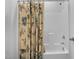 Clean shower with patterned curtain at 1024 Traditions Ridge Dr, Wake Forest, NC 27587