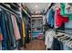 Walk-in closet with custom shelves and racks, providing ample storage at 1024 Traditions Ridge Dr, Wake Forest, NC 27587