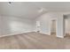 Bright bedroom featuring neutral walls and carpet, vaulted ceiling, and a closet at 104 Wilderness Ct, Mebane, NC 27302